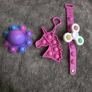Set of 3 Pop-It Fidget Sensory Toys Unicorn Bracelet Flower Pink Purple